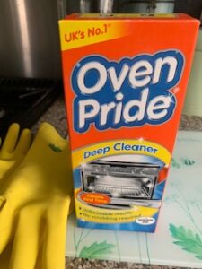 A box of Oven Pride cleaning product