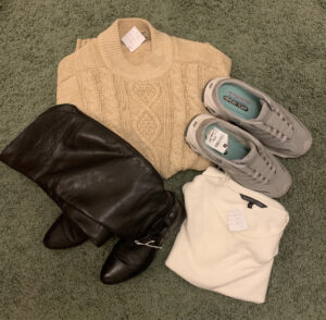 second hand shopping: jumper, boots, trainers