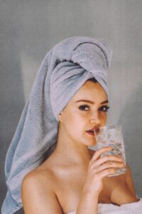 woman with a towel on her head