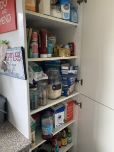 Messy food cupboard