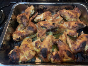 chicken wings in a baking dish