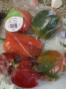 A large bag of sweet peppers