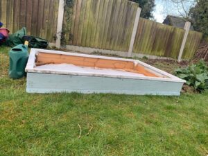A wooden raised bed