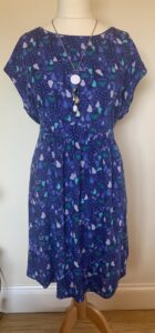 A blue dress on a mannequin
