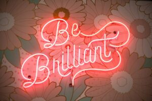 Neon sign saying Be Brilliant