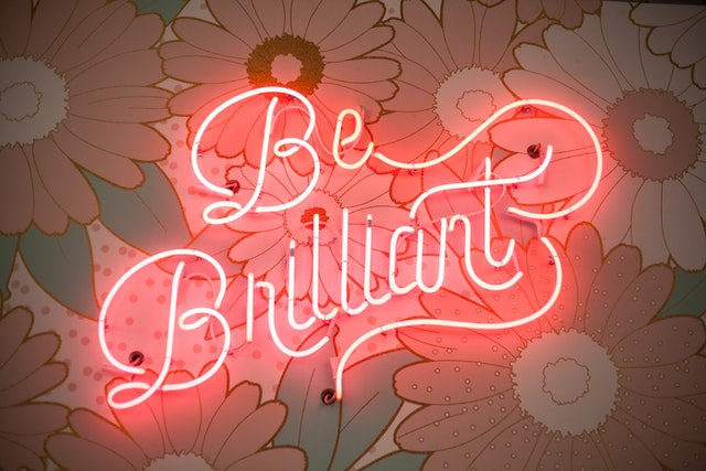 Neon sign saying Be Brilliant