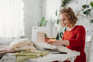 young woman at a sewing machine