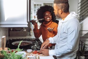A couple cooking together