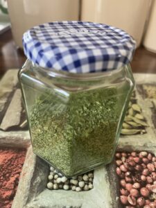 A jar of green kale powder