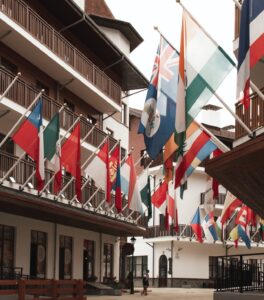 an olympic village with flags