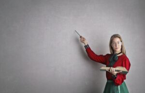 Woman at a white board