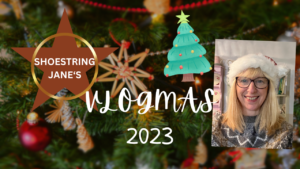 Title illustration for Vlogmas 2023. Me wearing a Christmas hat and a cartoon tree