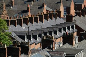 A rooftop view of some terraced houses.