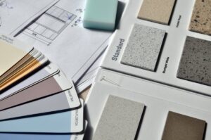 grey standard color book near green eraser
