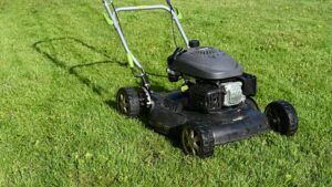 A push type lawn mower on grass