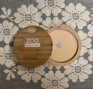 A pot of Zao face powder in a bamboo container