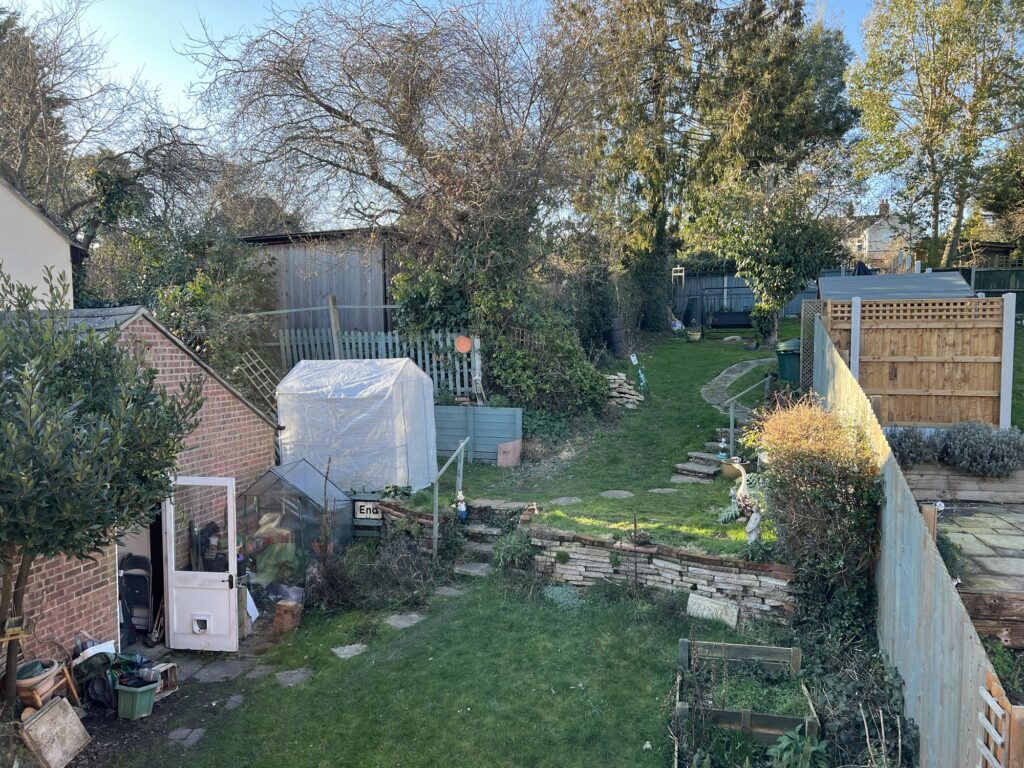 A stepped garden on an incline with stepping stones