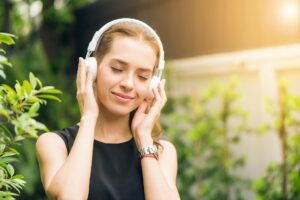 Woman listening to headphones