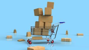 A toy shopping trolley ful of boxes
