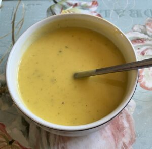 A bowl of pale orange soup